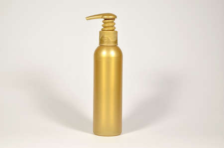 Golden color plastic unlabeled container with pumpの写真素材
