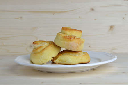 Butter pastry on white porcelain plateの写真素材