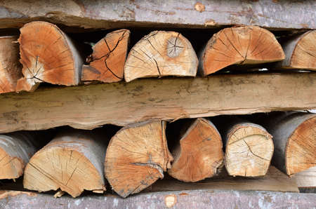 Pile of cut logs as a natural look background