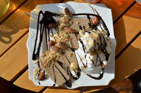 Chestnut puree served with cream, chocolate, almonds and hazelnuts