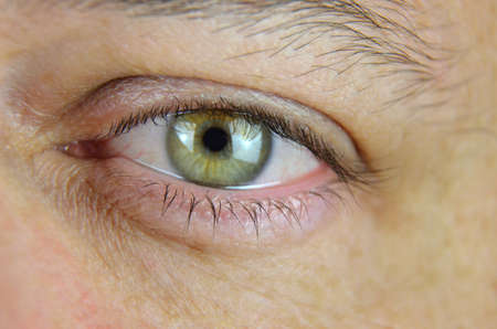 Close-up of a green man's left eye