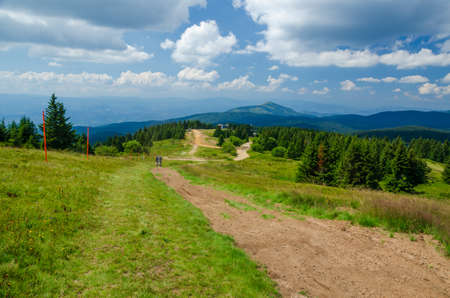 Picturesque landscape of meadows and hills in summer - Kopaonik, Serbiaの写真素材