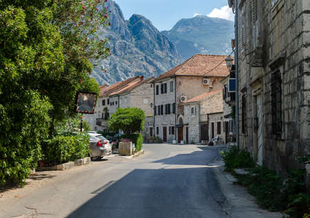 Street in a small coastal village with its houses in summer