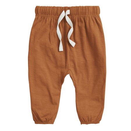 Instantly create beautiful images for your designs, with this Cute Baby Trousers Mockup In Leather Brown Color.の写真素材
