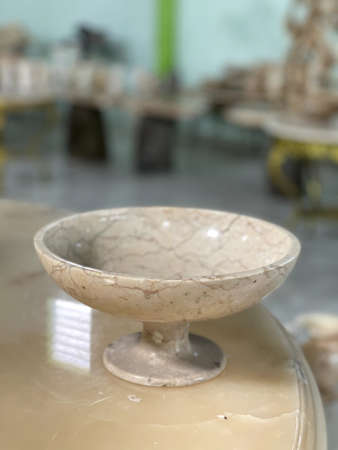 The container made of marble is like a plateの写真素材