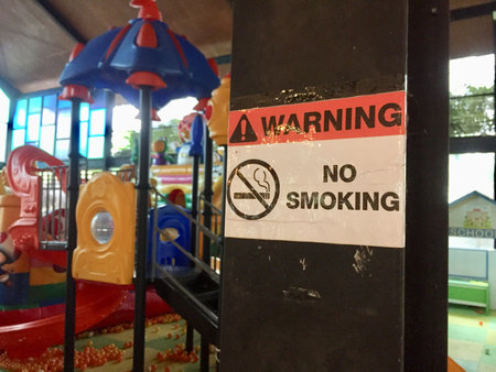no smoking sign posted in a children's play areaの写真素材
