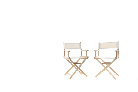 director chair made of wood and fabric well Comfortable sitting on a white backdrop, copy spaceの写真素材
