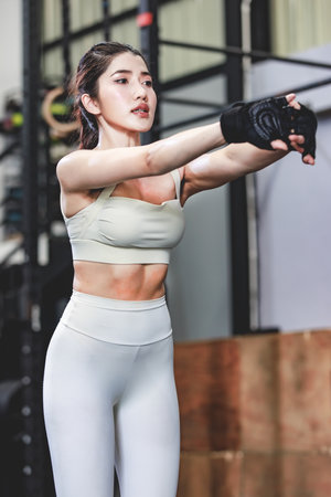 Asian young muscular fit strong body sporty athletic sexy female fitness workout sports bra leggings...
