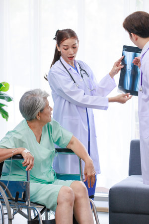 Asian young professional successful male and female doctor in white lab coat with stethoscope...