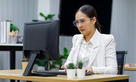 Millennial Asian young professional female businesswoman employee secretary staff officer in formal...