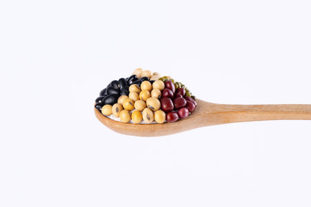 Multigrain, 5 kinds of bean in wooden spoon isolated on white background, Stop motion, food and drink object design.の写真素材