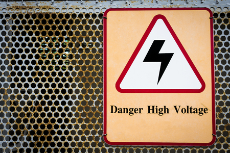 High voltage warning sign, Please do not get close because of the potentially dangerous.の写真素材