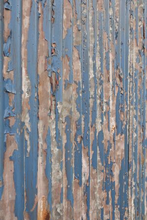 An abstract background image of rusty  iron sheets  to form a wall or fence