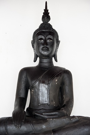 Black buddha statue image isolated on white backgroundの写真素材