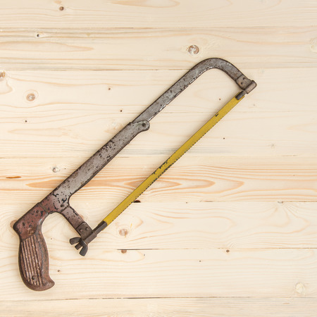 Hand saws for lumber on wooden backgroundの写真素材