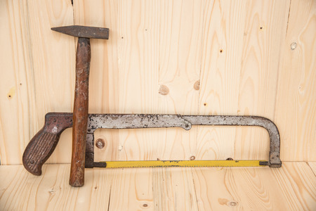 Hand saws for lumber on wooden backgroundの写真素材