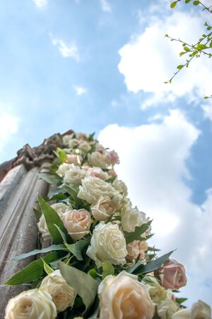 Flower decor column sky backgroundの写真素材