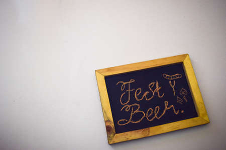 Celebrate october festival - clothes pins on grey/white background and a chalkboard with the slogan "Fest Beer"の写真素材