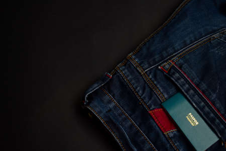 Closeup Passport, wallet, Jeans and Preparing for travelingの写真素材
