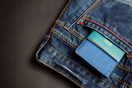 Closeup Passport, wallet, Jeans and Preparing for travelingの写真素材