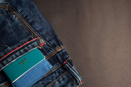 Closeup Passport, wallet, Jeans and Preparing for travelingの写真素材