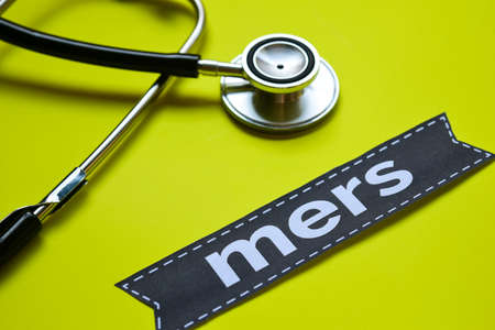 Closeup Mers in french with stethoscope concept inspiration on yellow backgroundの写真素材