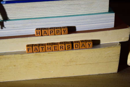 Happy father's day concept with celebrate words written on wooden blocksの写真素材