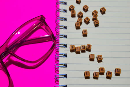 Time to learn message written on wooden blocks. Education concepts. Cross processed imageの写真素材