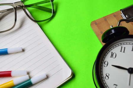 opened book in green background with motivation and education conceptsの写真素材