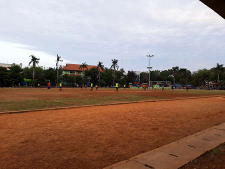 unrecognized people when play football in evening