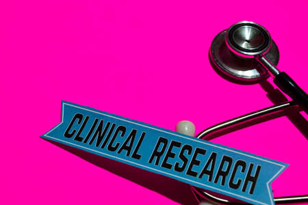 Clinical Research on the print paper with medicare Concept Inspiration. Stethoscope on pink bakcgroundの写真素材
