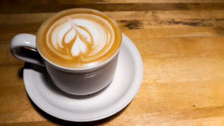 Close up shot coffee cup latte art