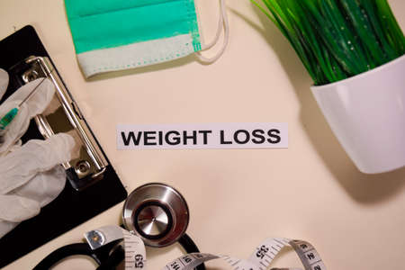 Weight Loss with inspiration and healthcare/medical concept on desk background