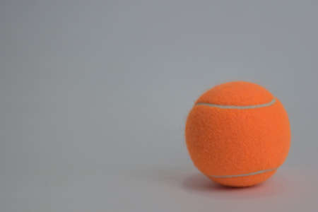 Close up tennis ball isolated on white backgroundの写真素材
