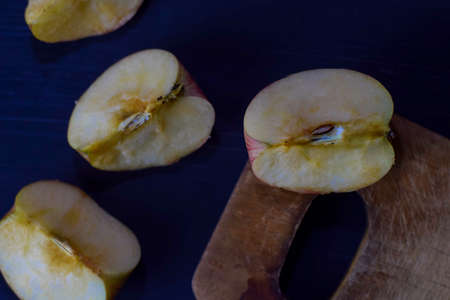 Fresh apple isolated on black tableの写真素材