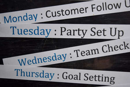 Close up making agenda weekly schedule on personal organizer. Business and entrepreneur concept....