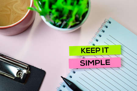 Keep it Simple text on sticky notes with office desk conceptの写真素材