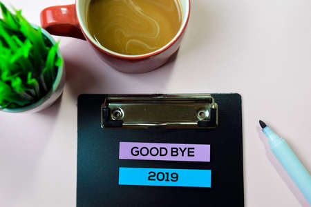 Good Bye 2019 text on sticky notes with office desk conceptの写真素材