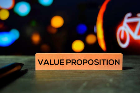 Value Proposition on the sticky notes with bokeh background