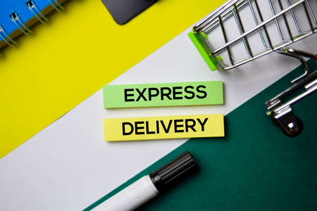Express Delivery text on sticky notes with office desk conceptの写真素材
