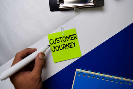 Customer Journey text on sticky notes with color office desk conceptの写真素材