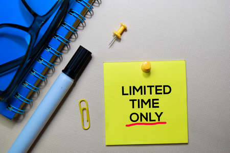 Limited Time Only text on sticky notes isolated on office deskの写真素材