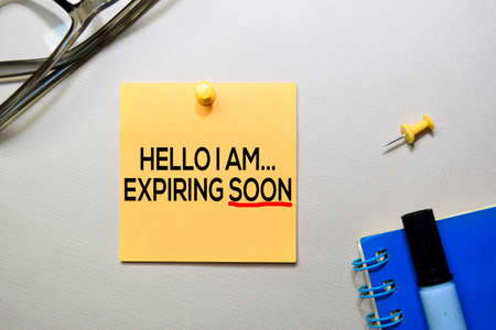 Hello I am Expiring Soon text on sticky notes isolated on office desk