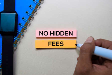 No Hidden Fees text on sticky notes isolated on office deskの写真素材