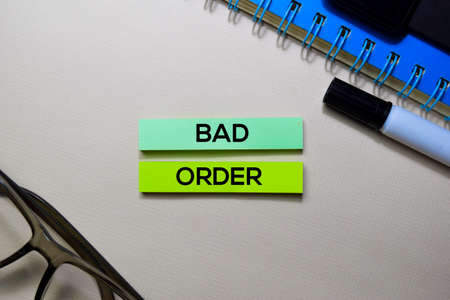 Bad Order text on sticky notes isolated on office desk
