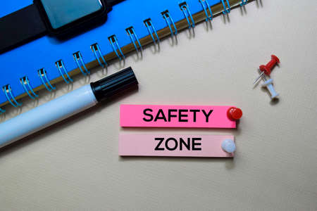 Safety Zone text on sticky notes isolated on office desk