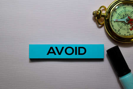 Avoid text on sticky notes isolated on office deskの写真素材