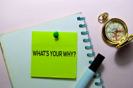 What's Your Why? text on sticky notes isolated on office deskの写真素材