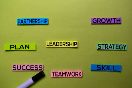 Leadership, Plan, Partnership, Growth, Strategy, Skill, Teamwork, Success text on sticky notes...