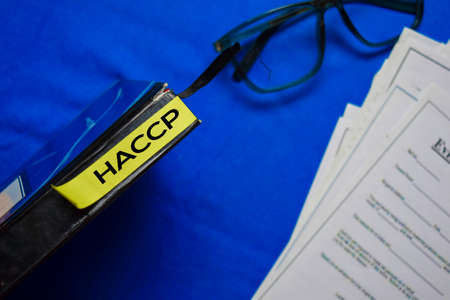 HACCP text on sticky notes isolated on office desk.の写真素材